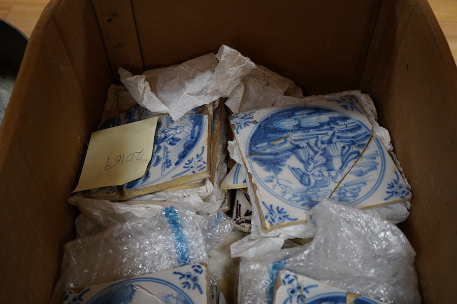 Twenty eight Delft blue and white tiles to include Christ in the Storm of Galilee